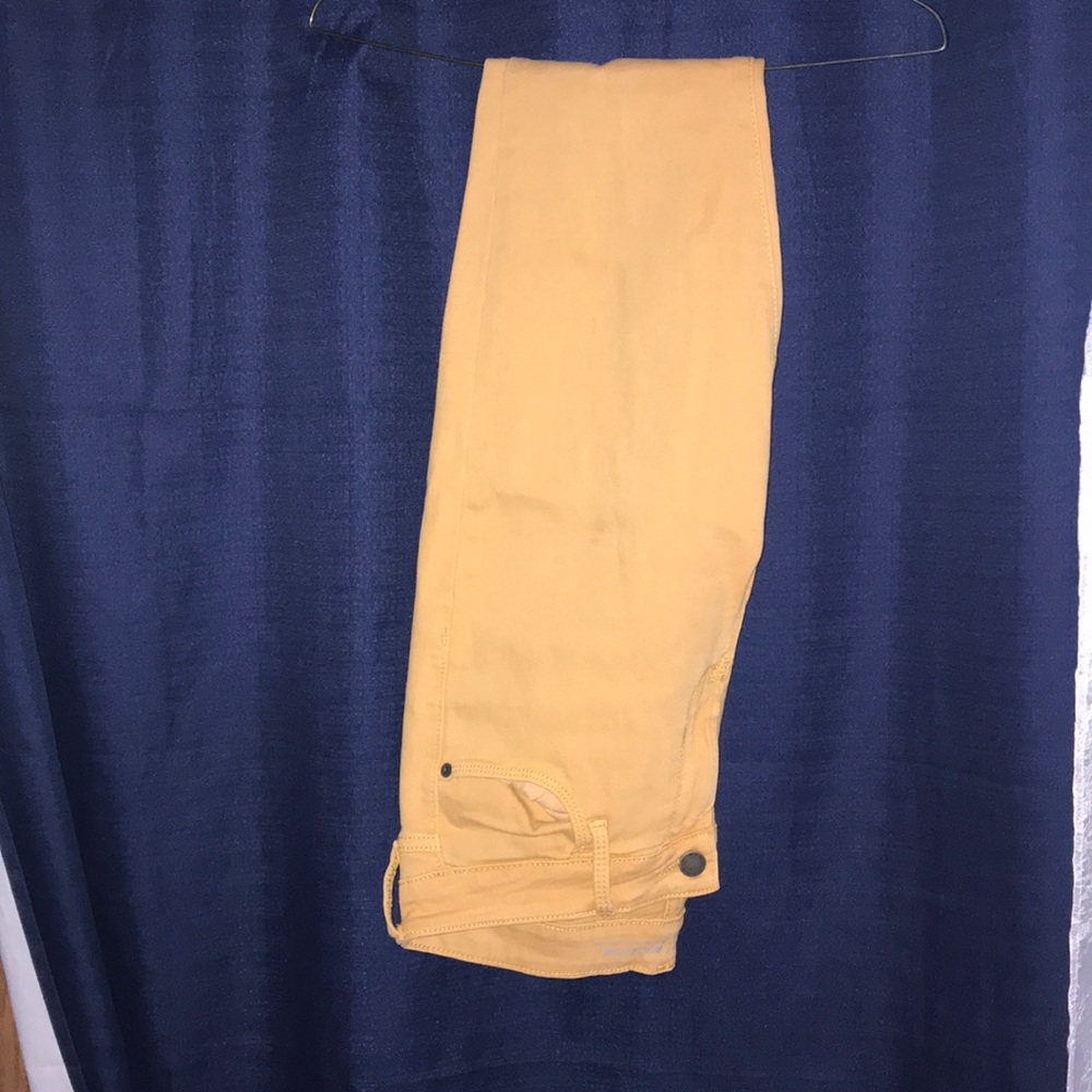 Extra long yellow skinny jeans